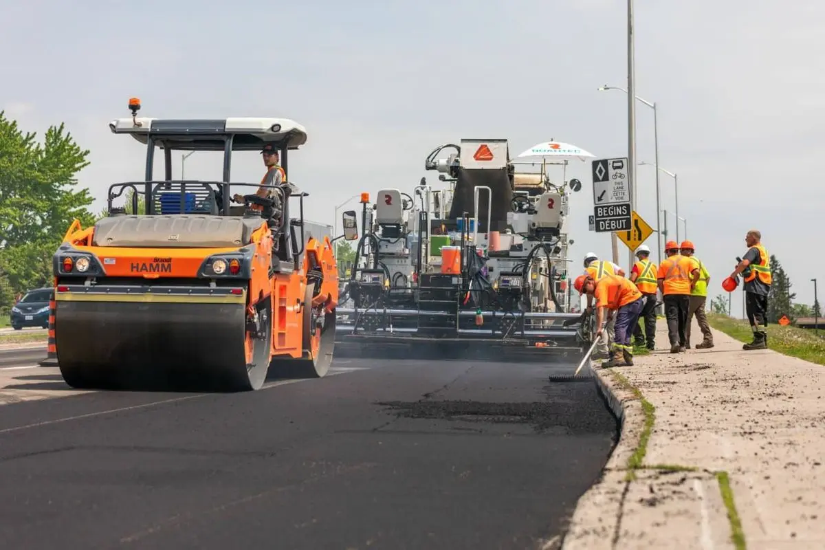 Asphalt paving crew